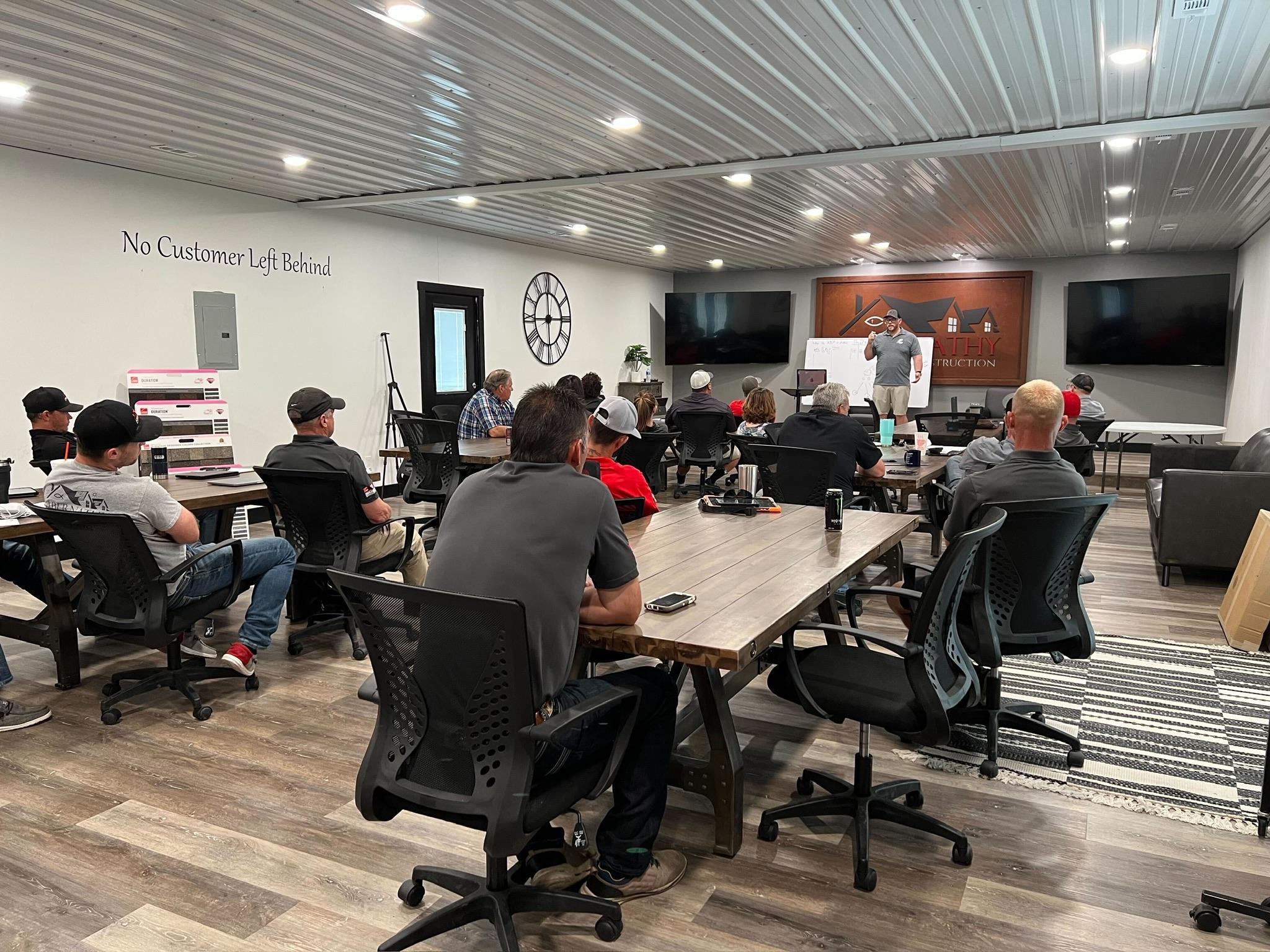 Roofing Business Partner - group meeting